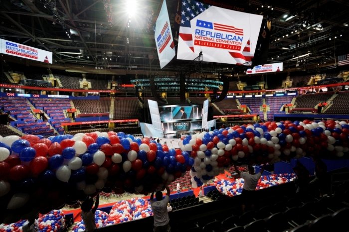 Workers carry balloons in the Quicken Loans Arena, site of the Republican National Convention in Cleveland, Ohio, U.S., July 15, 2016.