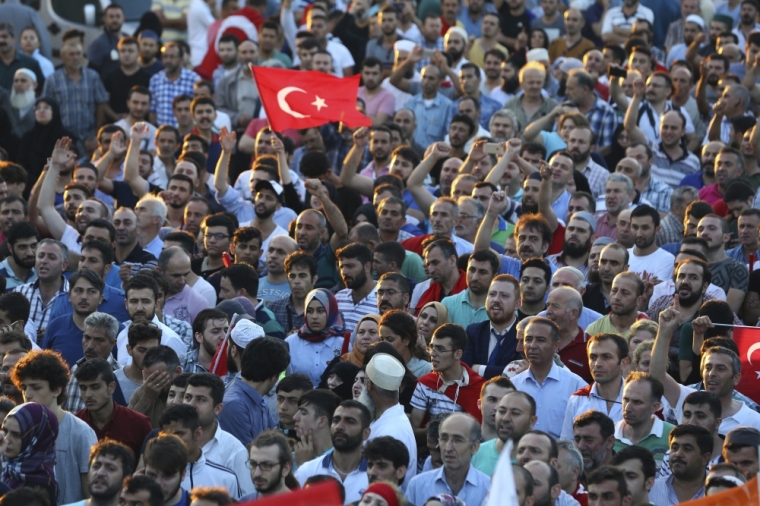 So-called supporters of Turkish President Tayyip Erdogan lat the Ataturk Airport in Istanbul, Turkey, July 16, 2016.