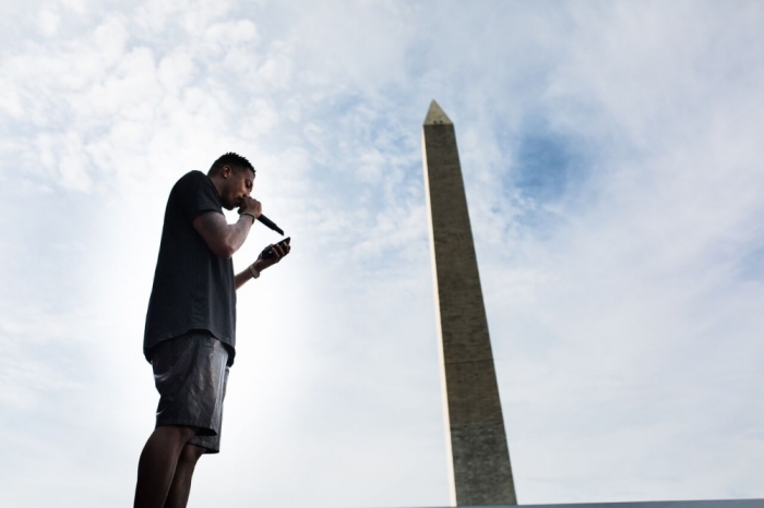 Rapper Lecrae hit the stage at Together 2016 and led thousands in a prayer, july 16 2016.