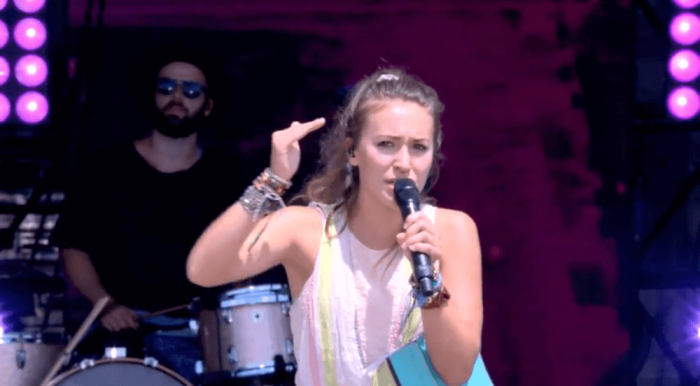 Singer Lauren Daigle speaks to the crowd at Together 2016 on Washington, D.C. on July 16, 2016.