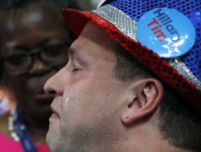 A delegate cries after Hillary Clinton became the Democratic presidential nominee at the Democratic National Convention in Philadelphia, Pennsylvania, U.S. July 26, 2016.