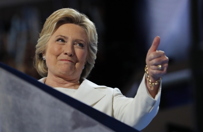 Democratic U.S. presidential nominee Hillary Clinton gives a thumbs up as she arrives to accept the nomination on the fourth and final night at the Democratic National Convention in Philadelphia, Pennsylvania, U.S. July 28, 2016.