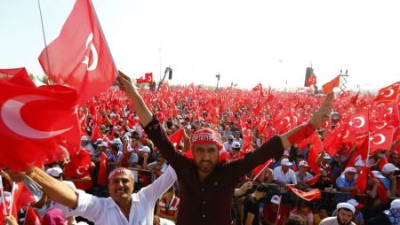 People wave Turkey's national flags during the Democracy and Martyrs Rally, organized by Turkish President Tayyip Erdogan and supported by ruling AK Party (AKP), oppositions Republican People's Party (CHP) and Nationalist Movement Party (MHP), to protest against last month's failed military coup attempt, in Istanbul, Turkey, August 7, 2016.