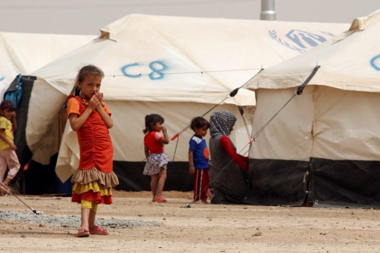 Displaced children, who fled from the Islamic State violence, gather at a refugee camp in the Makhmour area near Mosul, Iraq, June 17, 2016. Picture taken June, 17 2016.