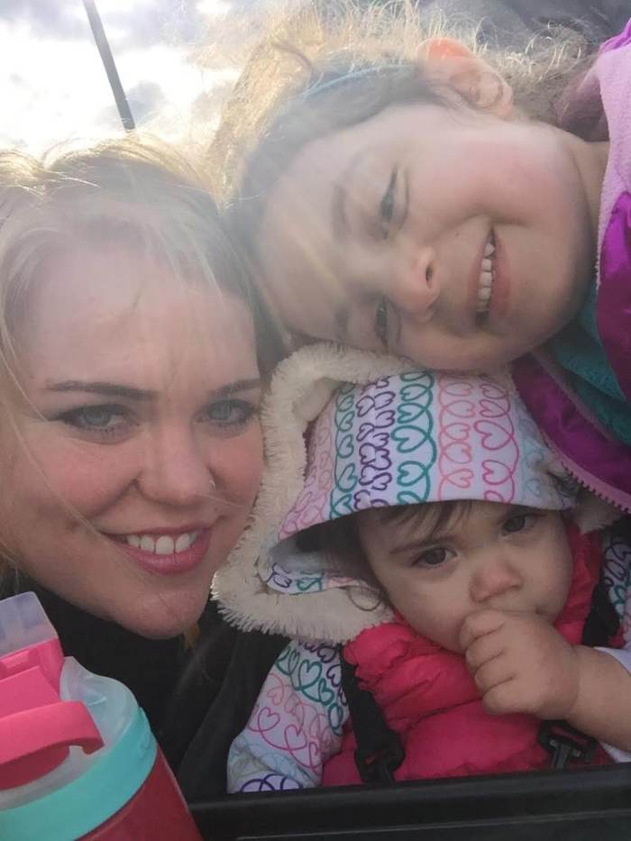 Kim Menon and her two children in this undated photo.