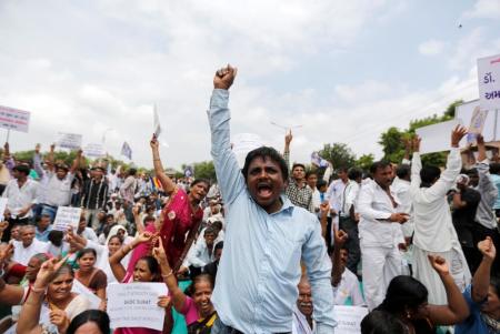 People shout slogans as they attend a protest rally against what they say are attacks on India's low-caste Dalit community in Ahmedabad, India, July 31, 2016.