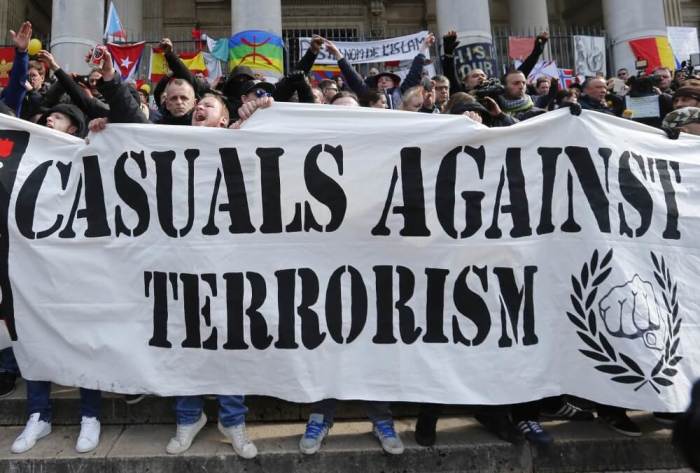 Right-wing demonstrators protest against terrorism in front of the old stock exchange in Brussels, Belgium, March 27. 2016.