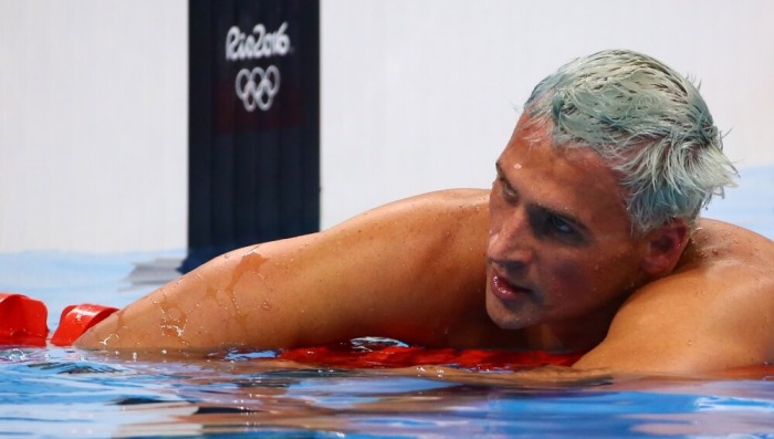 2016 Rio Olympics - Swimming - Final - Men's 200m Individual Medley Final - Olympic Aquatics Stadium - Rio de Janeiro, Brazil - 11/08/2016. Ryan Lochte (USA) of USA reacts.