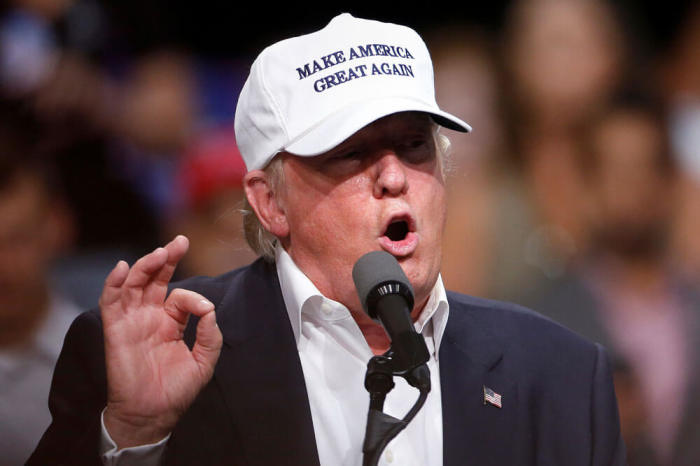 Republican presidential nominee Donald Trump speaks on stage during a campaign event in Dimondale, Michigan, U.S., August 19, 2016.