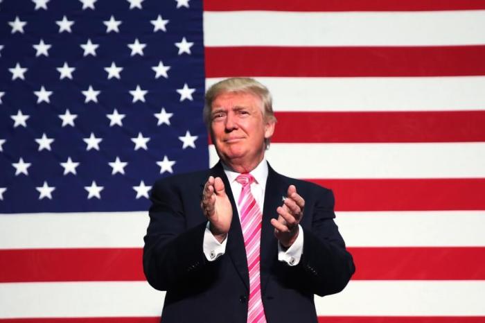 Republican presidential nominee Donald Trump speaks on stage during a campaign rally in Fredericksburg, Virginia, August 20, 2016.