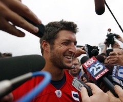 Tebow Tells Locker Room Cameraman, 'Jesus Loves You'