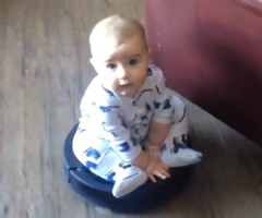 Adorable 7-Month-Old Baby Rides a Roomba Vacuum in This Hilarious Video (VIDEO)