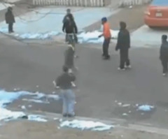 Caught on Camera: N.J. Cop Takes Time to Play Football With Kids on Street (VIDEO)