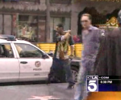 Man Screams 'I Love Jesus Christ', Smashes Police Car While Darth Vader Watches (VIDEO)