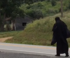 Woman In Black 'Driven By Faith' to Walk Streets of U.S, Virginia Police Confirm Her Motivation