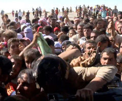 Yazidis Seen Storming Aid Helicopters at Mount Sinjar in Iraq in Dramatic Videos