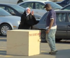 You Won't Stop Laughing When You See What This Nun Does to These Men Passing By (VIDEO)