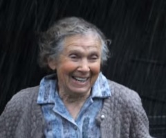 One Grandmother Goes Running in the Rain and You Would Never Believe Why! (VIDEO)