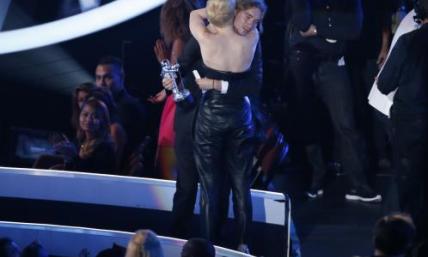 Miley Cyrus Lends Star Power to Homeless Youth Charity at VMAs; Donations Pour In (VIDEO)