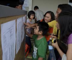 Air Asia Flight QZ8501 With 162 People on Board Likely 'at Bottom of Sea,' Rescue Agency Admits