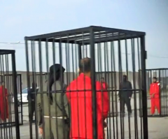 New ISIS Video Shows Kurd Fighters Being Paraded in Cages on Iraqi Streets