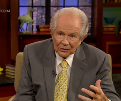 Pat Robertson Urges Christian Woman to Quit Her Job So She Doesn't Get 'Infected' by Buddhist Co-Workers