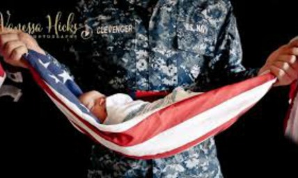 The Patriotic Photo of an Infant Wrapped in the American Flag and How It Rocked the Liberal Cradle