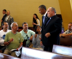 Obama Vows to Defend Human Rights in Talks With Cuba's Raul Castro as He Prays at National Shrine of Our Lady of Charity in Miami