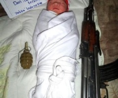 ISIS Support Rising in World's Largest Muslim Nation; Jihadists Post Photo of Baby Between Gun and Grenade