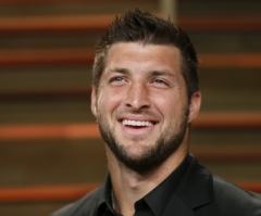 Tim Tebow Fan Gets Eagles QB to Sign Copy of the Bible at Philly Training Practice