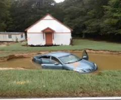 Grandma Praises God for Saving Her in Deadly Flood Using Giant Red Cross