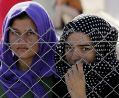 ISIS Locks Girls in Cages With Human Skulls for Violating Shariah Dress Code