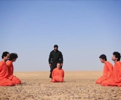 ISIS Video Shows 'US Spies' Hanging from Meat Hooks, Being Slaughtered like Sheep