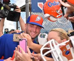 Tim Tebow 'Miracle': Christian Athlete Lays Hands on, Prays for Fan Having Seizure at Baseball Debut