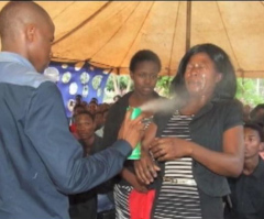 Pastor Spraying 'Doom' in People's Faces, Claims to Heal Cancer, HIV