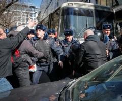 Putin Opponent Detained by Police Amid Massive Protests in Russia