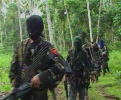 ISIS-Linked Militants Behead Police Chief, Take Catholic Priest, Worshipers Hostage in Philippines