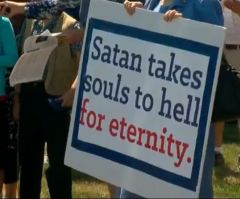 'Satan Takes Souls to Hell': Hundreds of Outraged Christians Hold Prayer Rally Against Satanic Monument