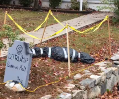 Neighbors Divided Over Halloween Gravestone That Condemns Trump to 'Burn in Hell'