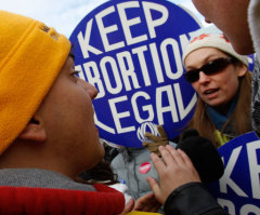 Will Rhode Island follow New York in legalizing abortion up to birth, for any reason?