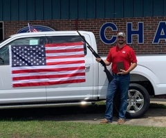 Anti-gun advocates roiled after Alabama car dealership offers free Bibles, shotguns and American flags 