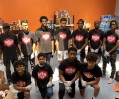 Young black males serve burned community in Minn. with pop-up grocery store