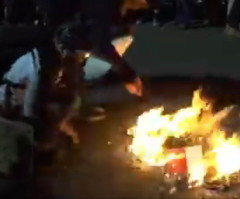 Portland rioters burn Bibles outside federal building