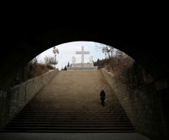 Chinese textbook rewrites Bible, claims Jesus stoned woman to death