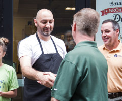 With free hot roasted chickens, a New York deli gives hope to scores of families in need