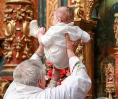 Romanian Orthodox Church's full-immersion baptism ritual under fire after infant dies 