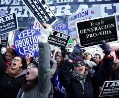 Arkansas Gov. signs sweeping abortion ban aimed at challenging Roe v. Wade