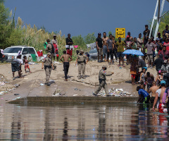 Biden admin. ramps up deportation flights after migrant encampment at border swells to over 15,000 