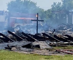 Wooden cross is only thing left standing after historic church burns down: 'A sign from the Lord'