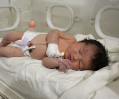 Newborn with umbilical cord attached rescued from earthquake rubble in Syria